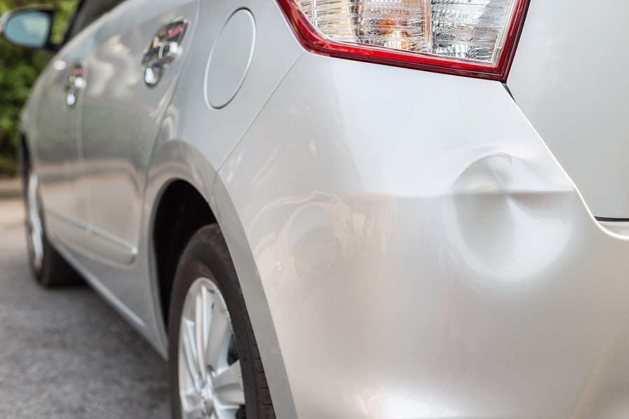 How To Get A Dent Out Of A Car – What Causes Dents In Cars?