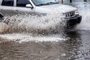 Insurance companies cover flood damage only if you have comprehensive insurance coverage. Otherwise, you should take care of repair costs out of pocket.